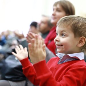 child clapping