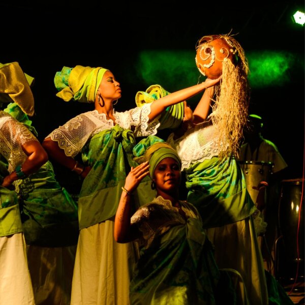 Women on stage in costumes